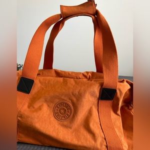 Kipling rollaway luggage.